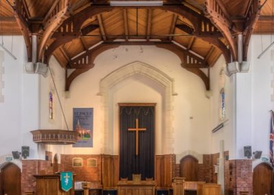 The chancel of St Paul's church with its wooden cross
