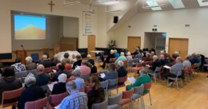 Congregation seated in the worship centre during a service