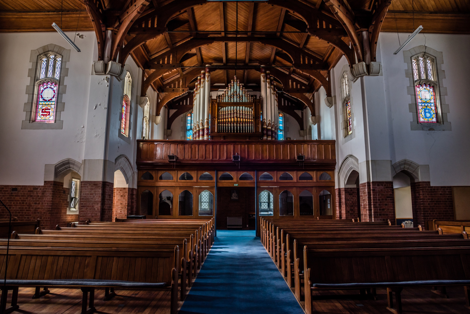 Interior of St Paul's church looking back over the pews to the organ gallery